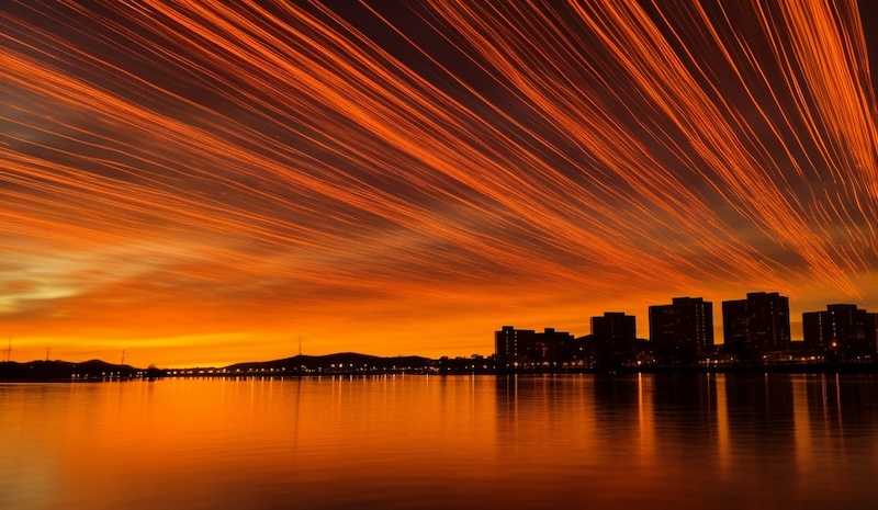 Streaks of amber above a lake